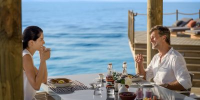 InterContinental Maldives - Couple in villa dining at 3 Bedroom Overwater Residence